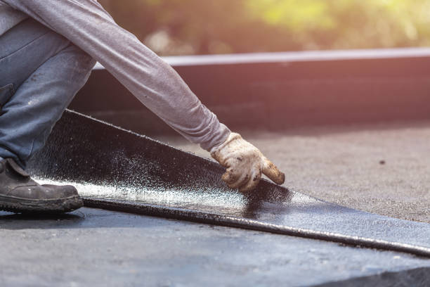 Professional Waterproofing technician working in Goodrich, MI